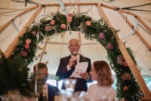 Wedding Arch dressed with locally sources flowers
