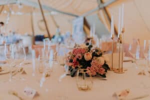 Round Tables and chairs inside Covered in Style Tipi